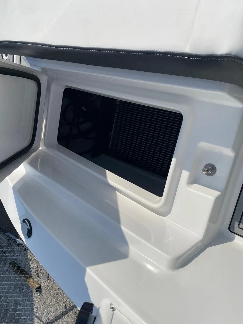 Slide: The Image of 2025 Monterey M-22 boat storage compartment with open hatch. - 20