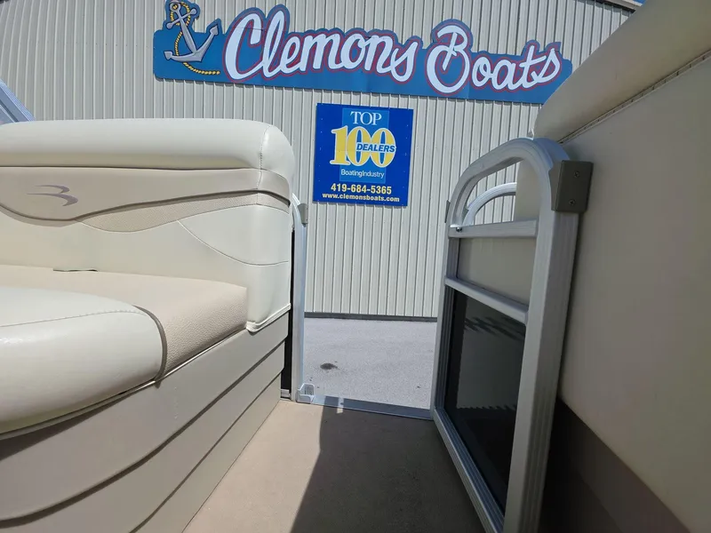 Slide: The Image of 2013 Bennington 24 SSLX boat at Clemons Boats dealership. - 13