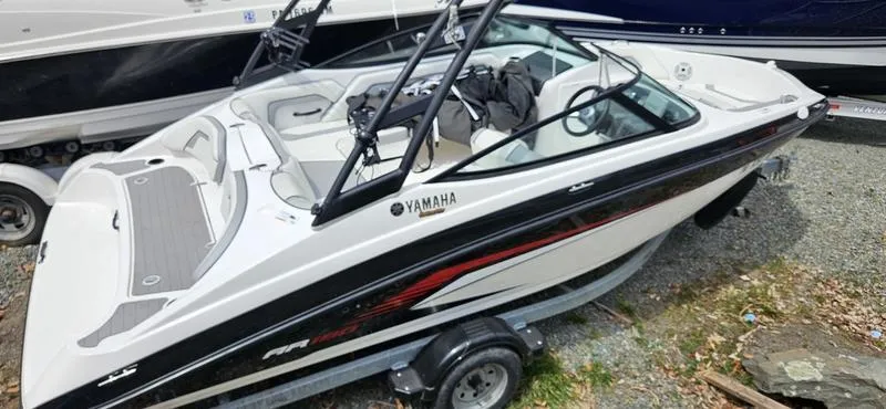 Slide: The Image of 2018 Yamaha AR190 boat on trailer, white and black design with red accents. - 3