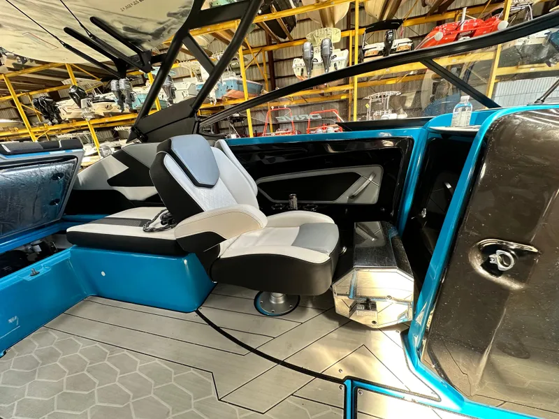 Slide: The Image of 2023 Yamaha Boats 255XD interior with modern seating and sleek design. - 18