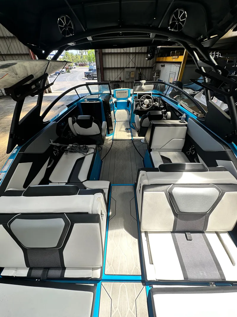 Slide: The Image of 2023 Yamaha Boats 255XD interior with modern seating and sleek design. - 6
