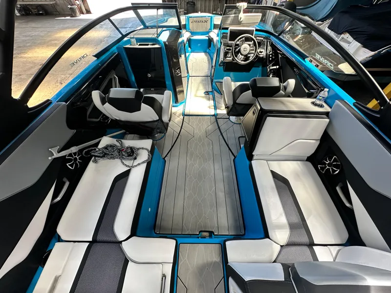 Slide: The Image of 2023 Yamaha Boats 255XD interior with modern seating and sleek design. - 8