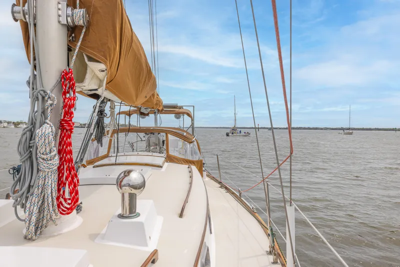 Slide: The Image of Sailboat on open water, Bristol 40 model, 1981, with clear blue sky. - 42