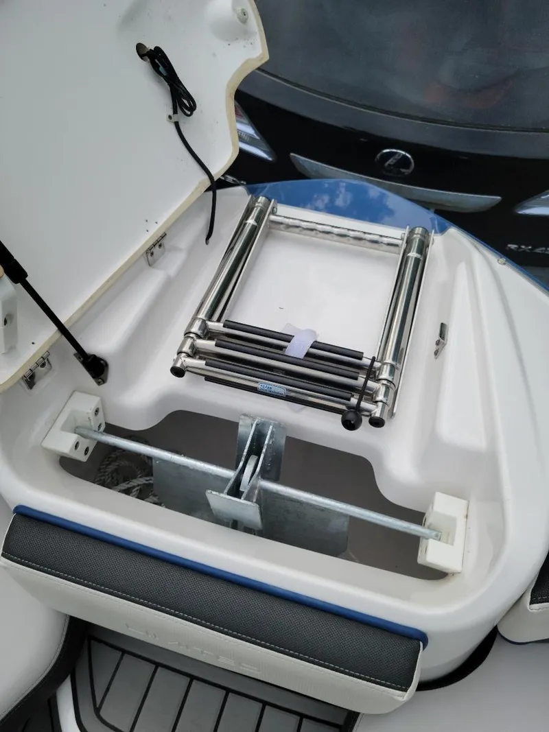 Slide: The Image of 2018 Yamaha Boats 242 Limited S swim platform with foldable ladder. - 17