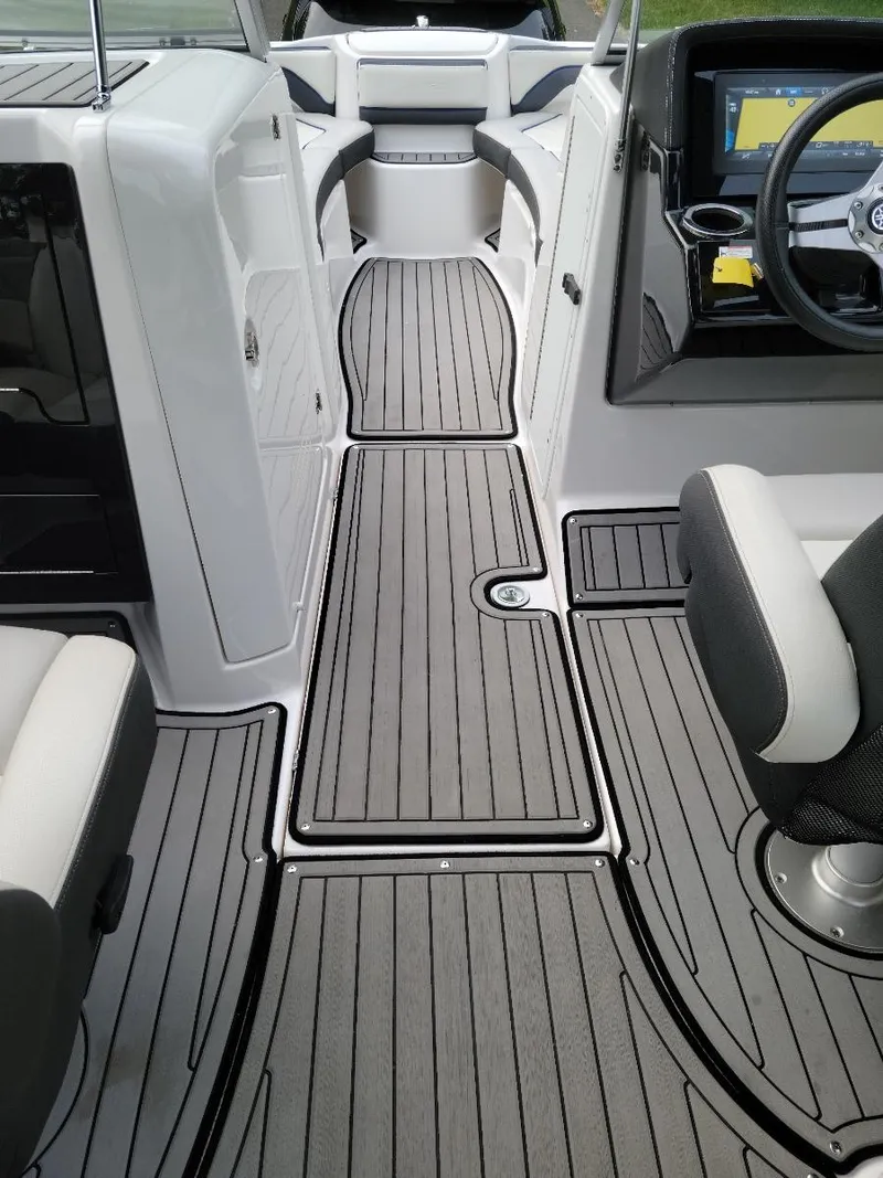 Slide: The Image of 2018 Yamaha Boats 242 Limited S interior with sleek, modern design and comfortable seating. - 19