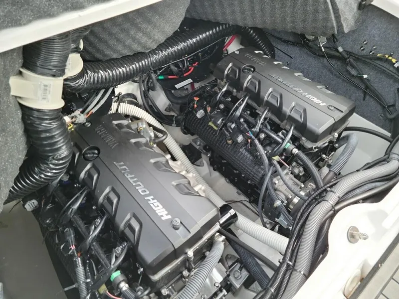 Slide: The Image of 2018 Yamaha Boats 242 Limited S engine compartment with dual high-output engines. - 20