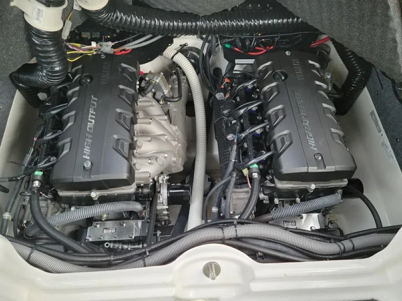 Slide: The Image of 2018 Yamaha Boats 242 Limited S engine compartment with dual high-output engines. - 21