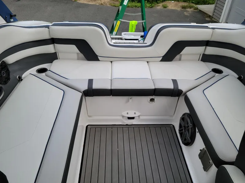 Slide: The Image of 2018 Yamaha Boats 242 Limited S interior with sleek seating and modern design. - 5