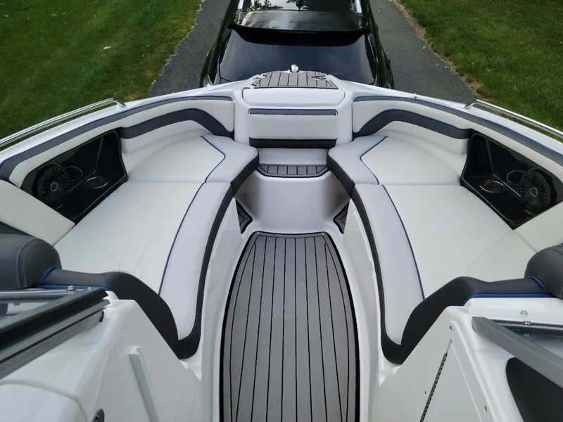 Slide: The Image of 2018 Yamaha Boats 242 Limited S interior with sleek seating and modern design. - 7