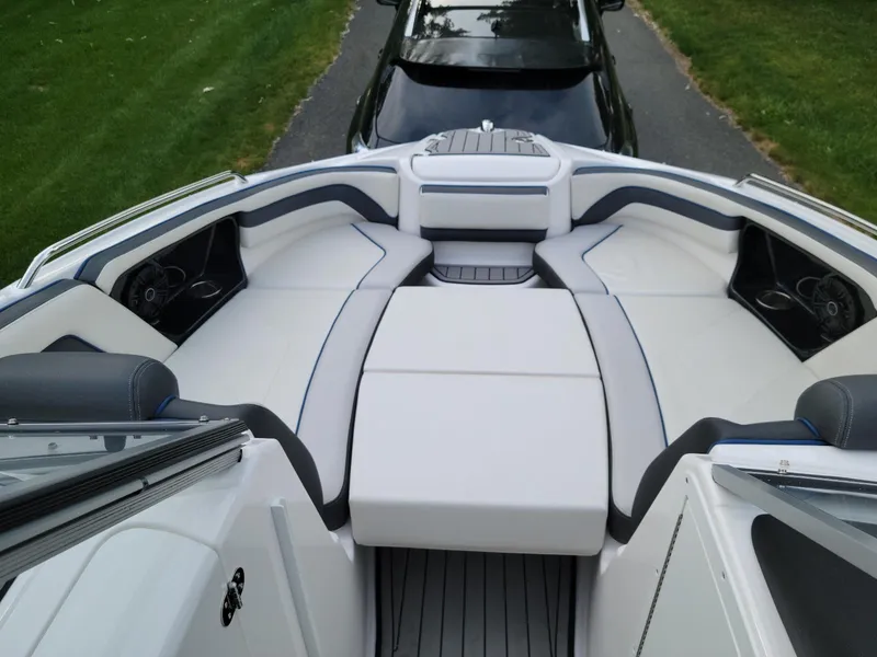Slide: The Image of 2018 Yamaha Boats 242 Limited S interior with plush seating and sleek design. - 8