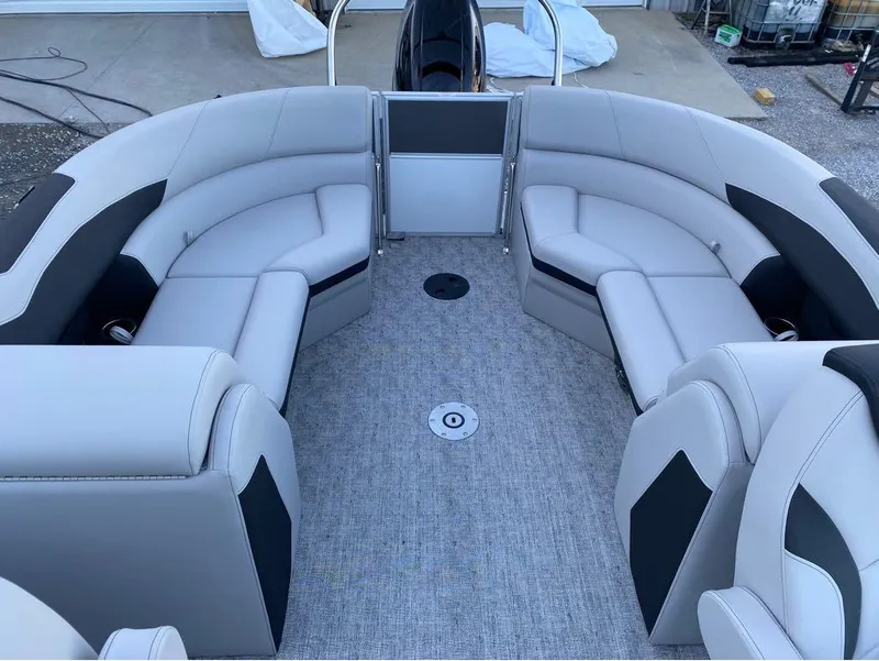 Slide: The Image of 2024 Berkshire LE Series 22RFX LE pontoon boat interior with plush seating. - 11