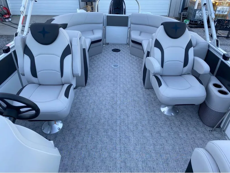 Slide: The Image of 2024 Berkshire LE Series 22RFX LE pontoon boat interior with plush seating and modern design. - 12