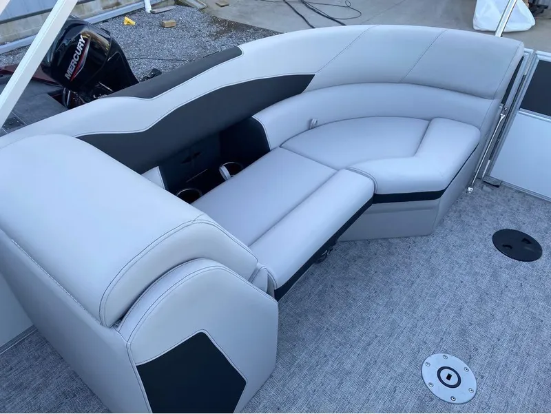 Slide: The Image of 2024 Berkshire LE Series 22RFX LE boat interior with plush seating and modern design. - 16