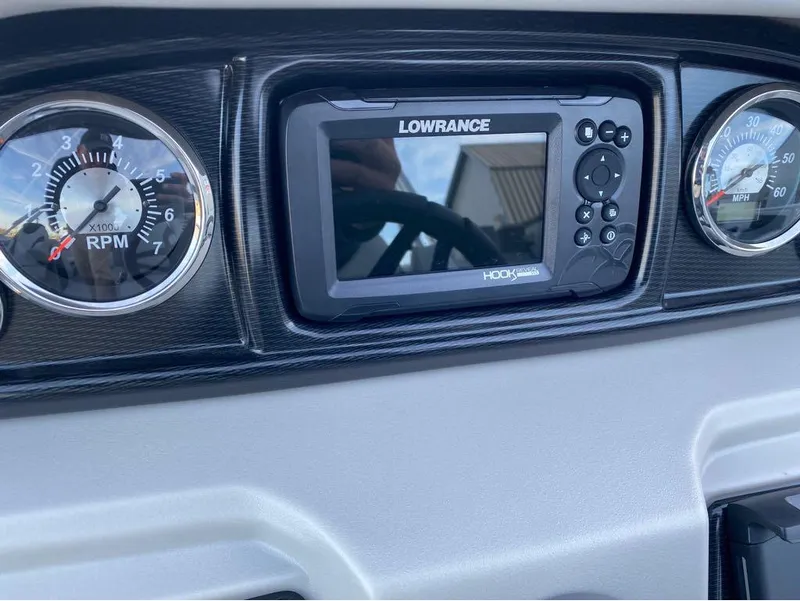 Slide: The Image of Dashboard of 2024 Berkshire LE Series 22RFX LE with Lowrance display and gauges. - 20