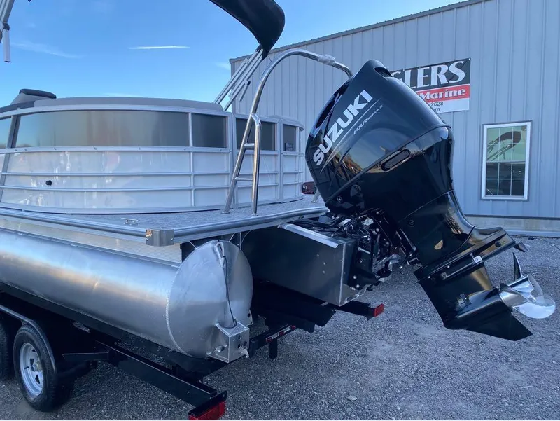 Slide: The Image of 2024 Berkshire LE Series 22RFX LE pontoon boat with Suzuki outboard motor. - 6