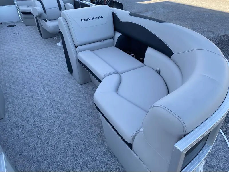 Slide: The Image of 2024 Berkshire LE Series 22RFX LE pontoon boat with luxurious seating and modern design. - 8