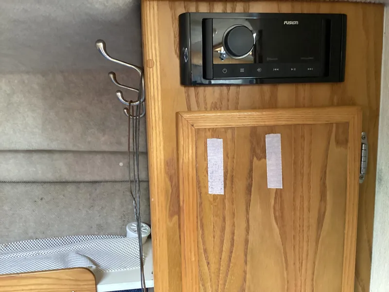 Slide: The Image of Interior of 2001 Henriques 28 Express with wooden cabinet and Fusion stereo system. - 21