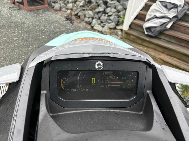 Slide: The Image of 2022 Sea-Doo Wake Pro 230 dashboard display with digital speedometer and controls. - 14