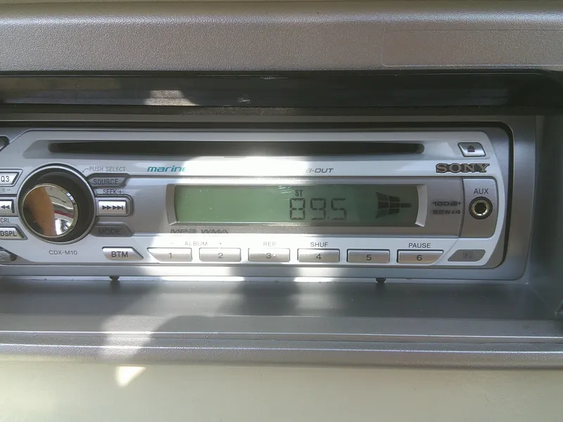 Slide: The Image of Marine stereo system on a 2011 Hurricane SunDeck Sport 188 IO boat. - 12