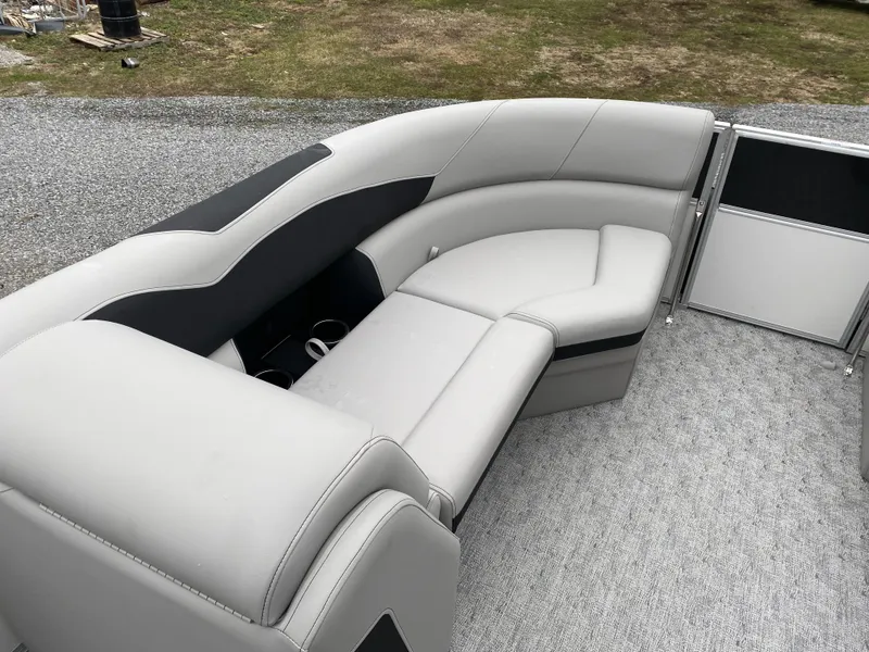 Slide: The Image of 2024 Berkshire 24RFX LE pontoon boat with luxurious gray seating and carpeted flooring. - 13