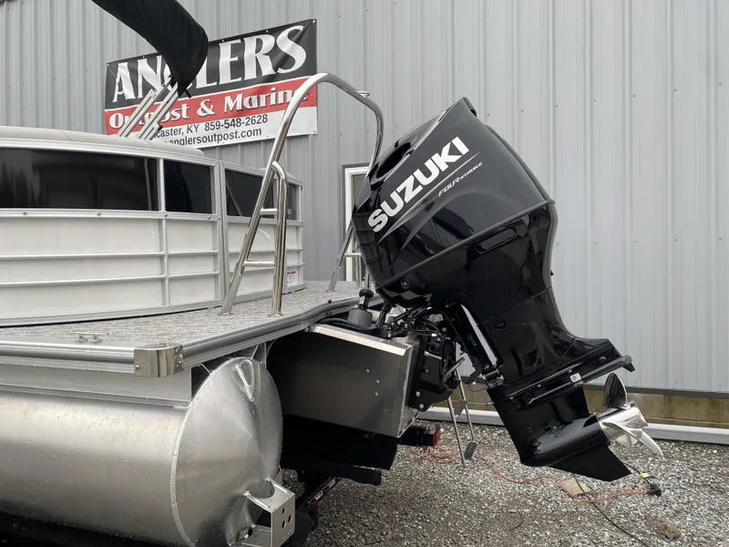 Slide: The Image of 2024 Berkshire 24RFX LE pontoon boat with Suzuki outboard motor. - 20