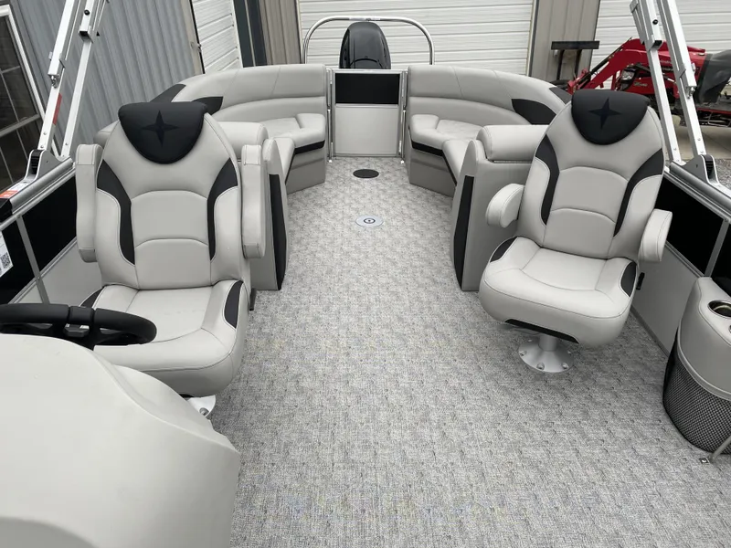 Slide: The Image of 2024 Berkshire 24RFX LE pontoon boat interior with plush seating and modern design. - 6