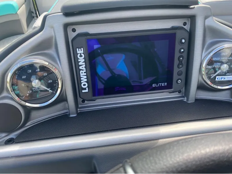 Slide: The Image of Dashboard of 2025 Berkshire 25 SB2 STS with Lowrance Elite display and gauges. - 17