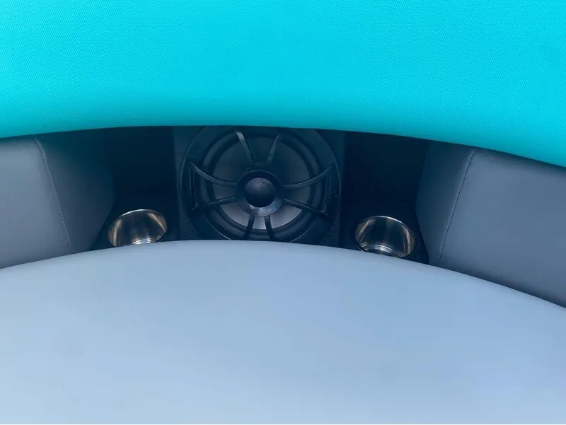 Slide: The Image of Interior of 2025 Berkshire 25 SB2 STS boat with speaker and cup holders. - 7