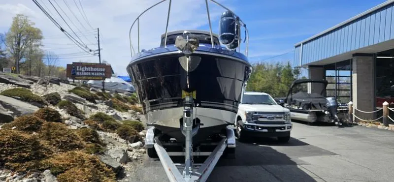 Slide: The Image of 2015 Monterey 295 Sport Yacht on trailer at marina, front view. - 27