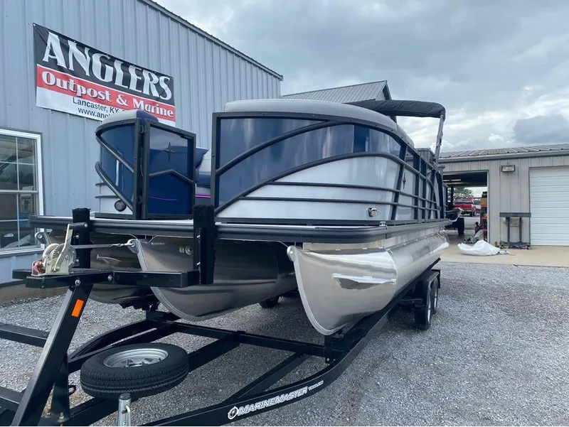Slide: The Image of 2025 Berkshire 23E STS pontoon boat on trailer at Anglers Outpost & Marine. - 16