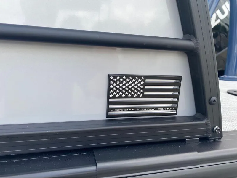 Slide: The Image of 2025 Berkshire 23E STS badge with American flag and "A Berkshire Hathaway Company" text. - 17