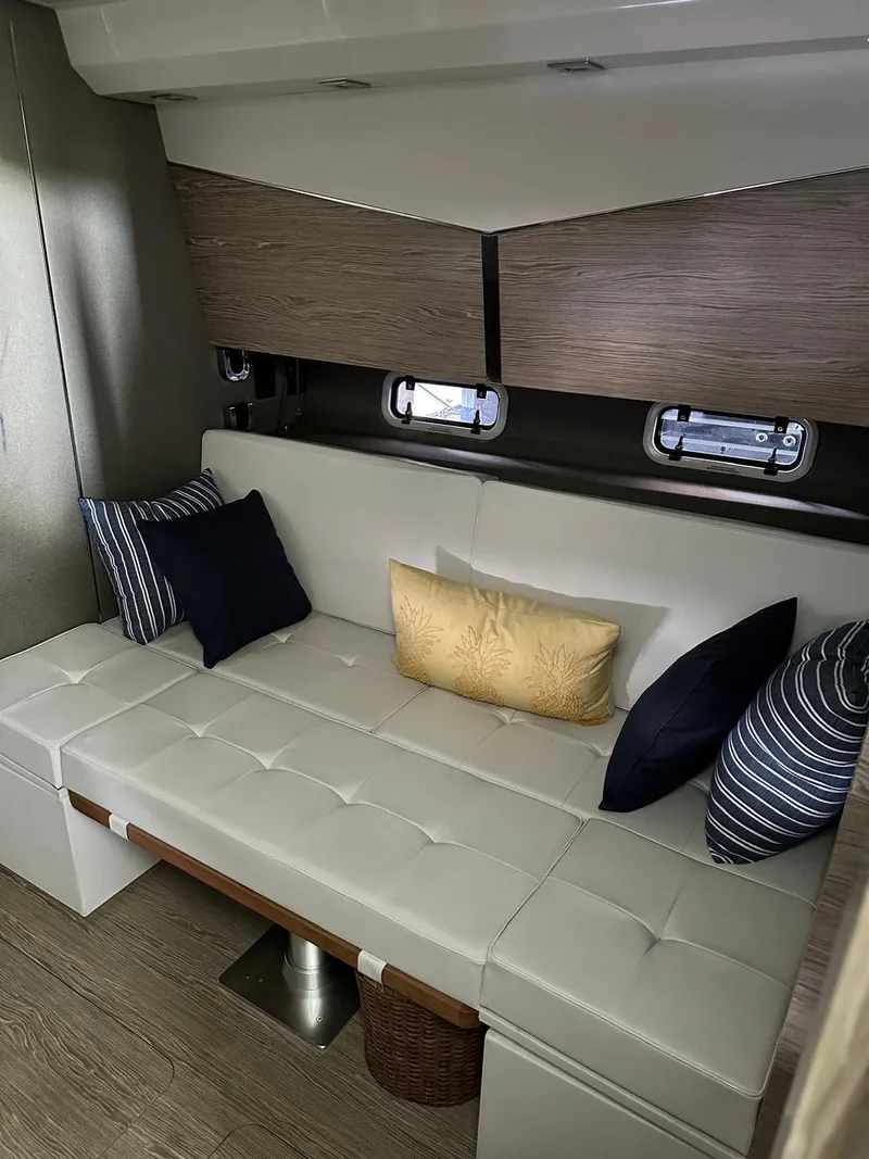 Slide: The Image of Interior of 2020 Azimut Verve 40 yacht with elegant seating and cushions. - 26