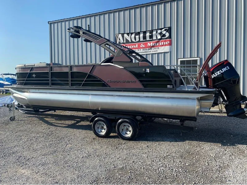Slide: The Image of 2025 Berkshire 23UL STS pontoon boat with Suzuki outboard motor, displayed at Anglers Boat & Marine. - 6