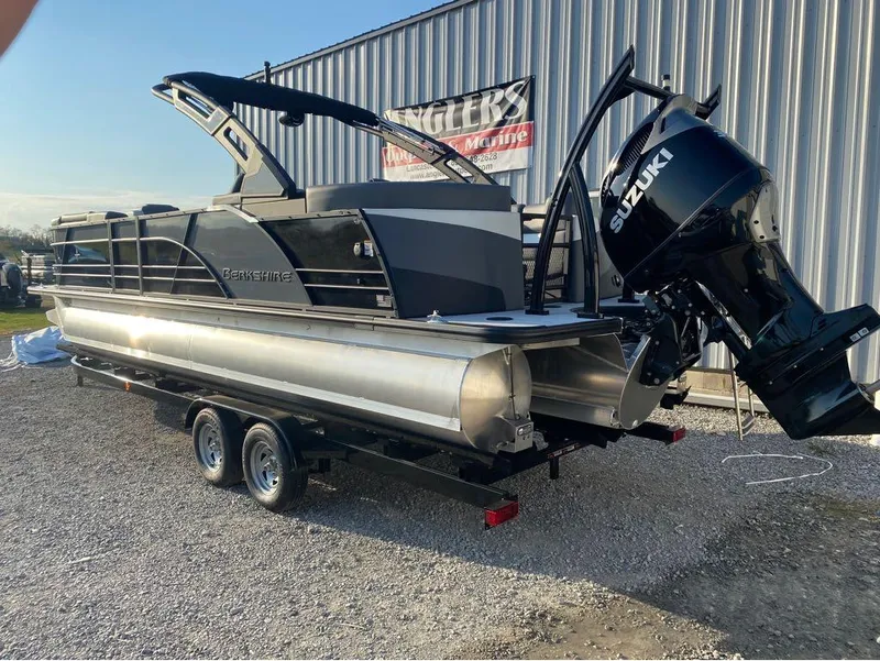 Slide: The Image of 2025 Berkshire 25RFX STS pontoon boat with Suzuki engine on trailer. - 15