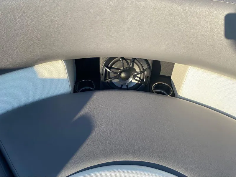 Slide: The Image of Interior of 2025 Berkshire 25RFX STS boat with speaker and cup holders. - 16