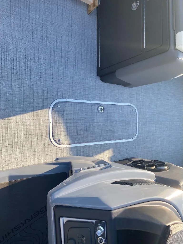 Slide: The Image of Interior view of 2025 Berkshire 25RFX STS boat with sleek design and modern features. - 4