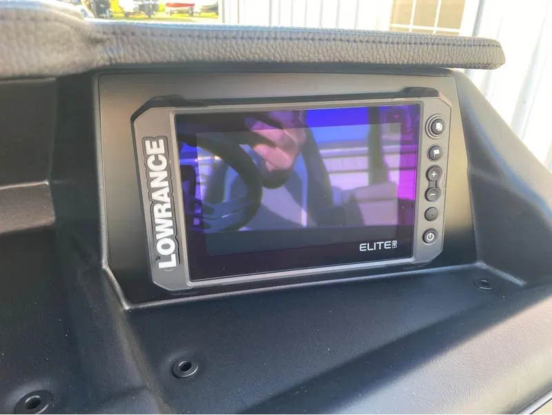 Slide: The Image of Lowrance Elite display on 2025 Berkshire 25RFX STS boat dashboard. - 7