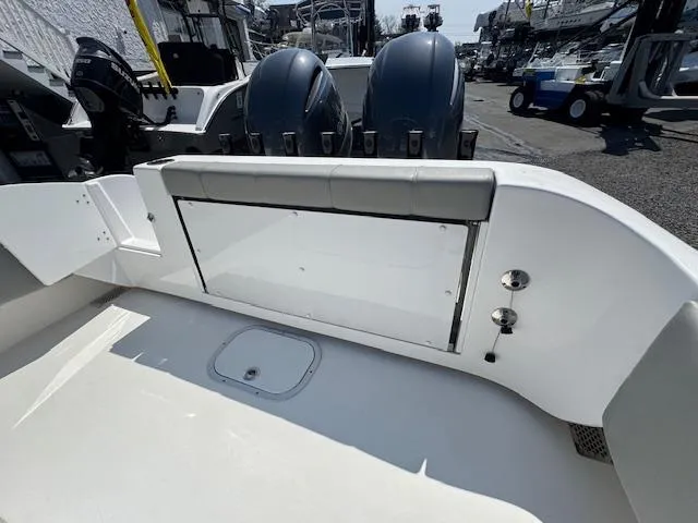 Slide: The Image of 2022 Cape Horn 27 XS boat interior with dual outboard motors. - 10