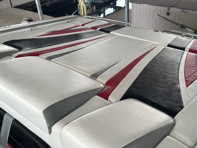 Slide: The Image of 2008 Formula 353 FASTech boat upholstery with red, black, and white design. - 20