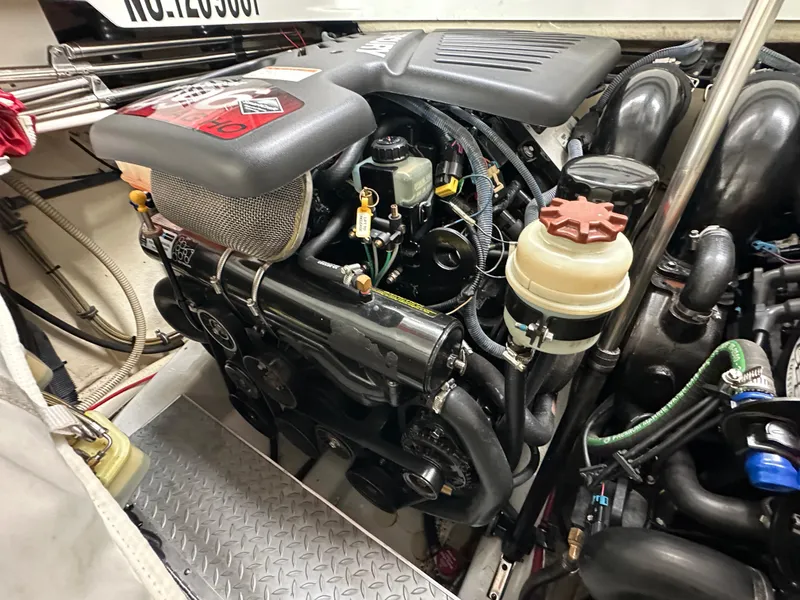 Slide: The Image of 2008 Formula 353 FASTech engine compartment showcasing detailed mechanical components and systems. - 26