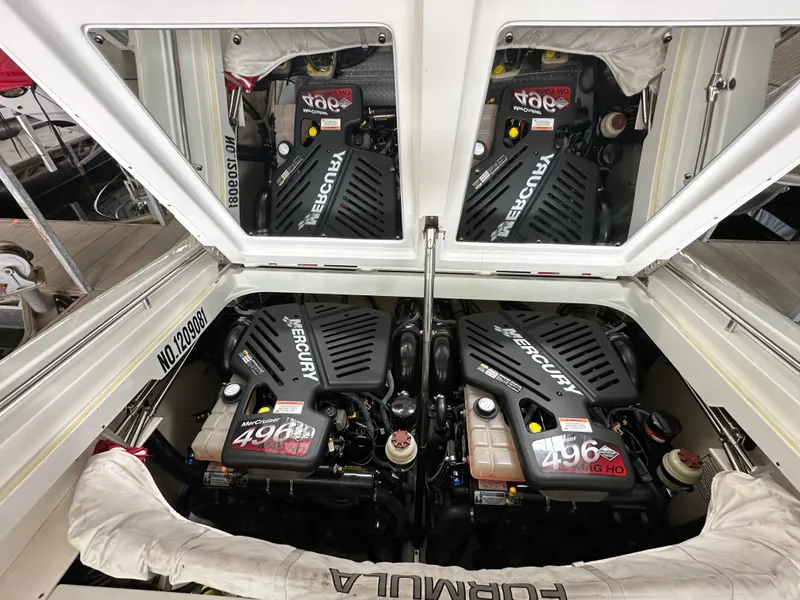 Slide: The Image of 2008 Formula 353 FASTech boat engine compartment with dual Mercury 496 engines. - 29