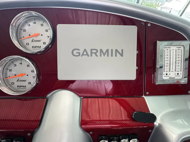 Slide: The Image of Dashboard of 2008 Formula 353 FASTech with Garmin display and Livorsi RPM gauges. - 33