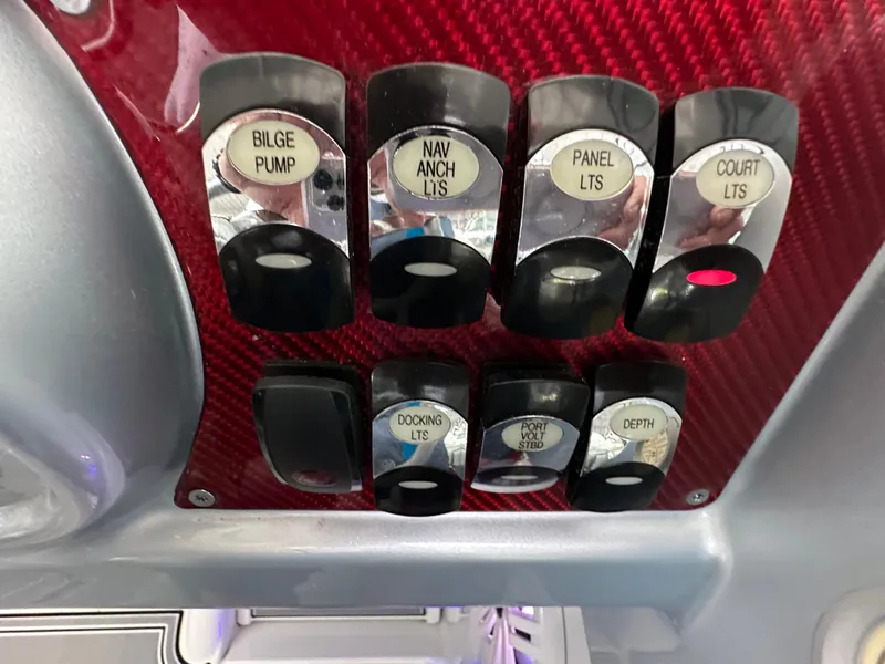 Slide: The Image of Control panel of a 2008 Formula 353 FASTech boat with labeled switches. - 35