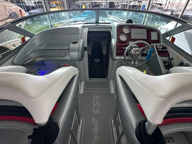 Slide: The Image of 2008 Formula 353 FASTech boat cockpit with modern controls and seating. - 38
