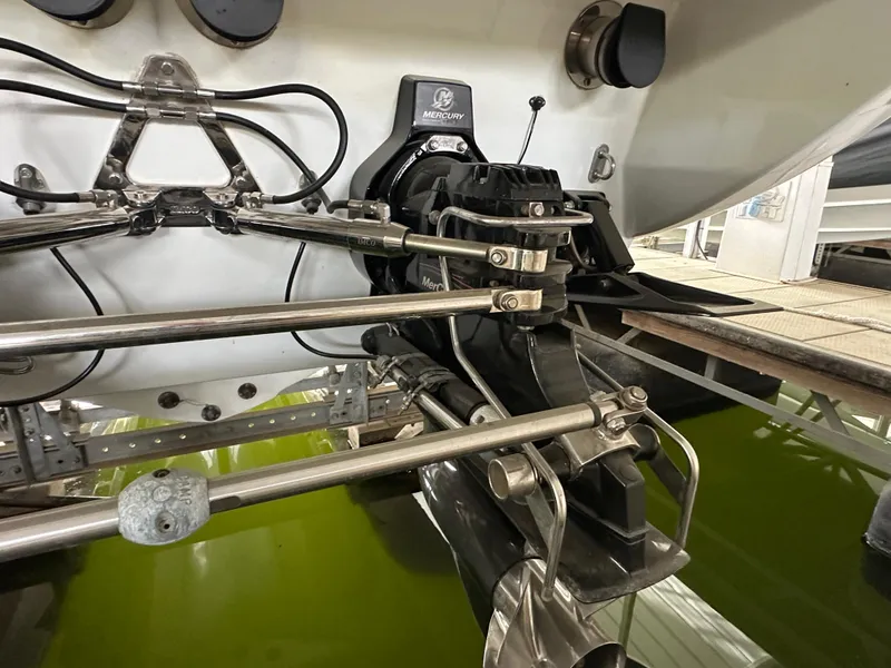 Slide: The Image of 2008 Formula 353 FASTech boat engine components with stainless steel fittings and Mercury branding. - 8