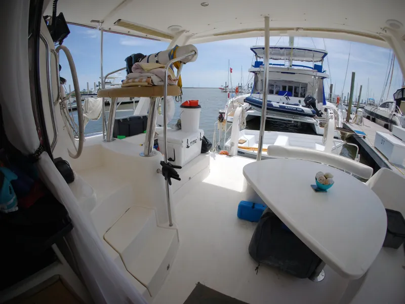 Slide: The Image of Interior view of a 2005 Leopard 40 catamaran docked at a marina. - 25