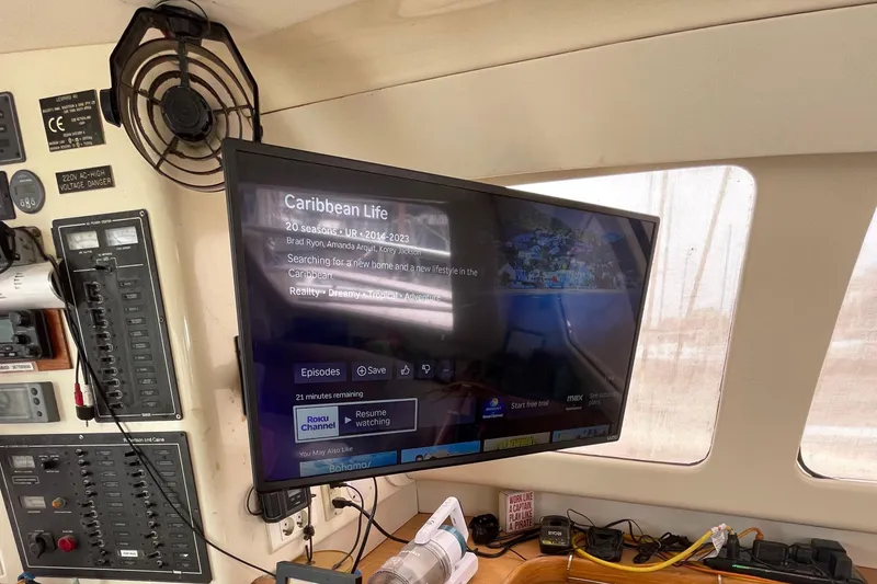 Slide: The Image of TV screen on a 2005 Leopard 40 yacht displaying "Caribbean Life" episode. - 30