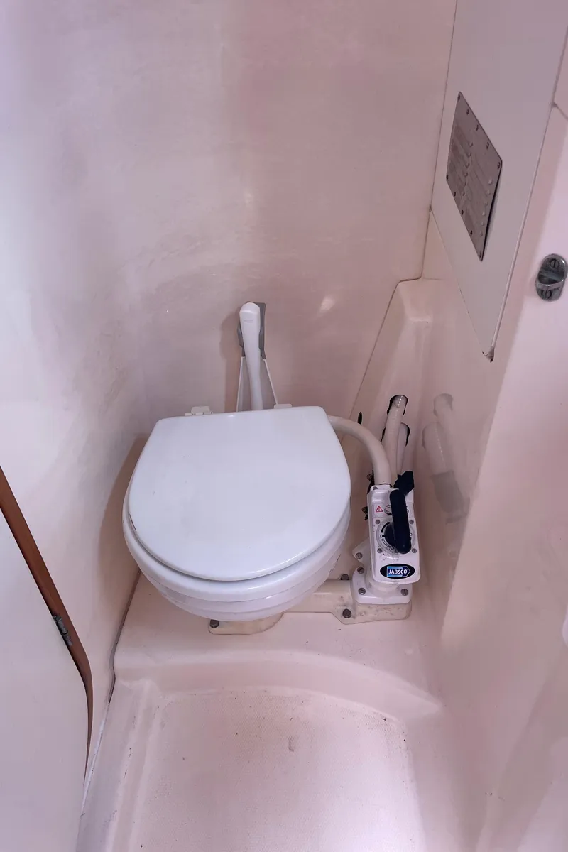 Slide: The Image of 2005 Leopard 40 marine toilet in compact bathroom space. - 45