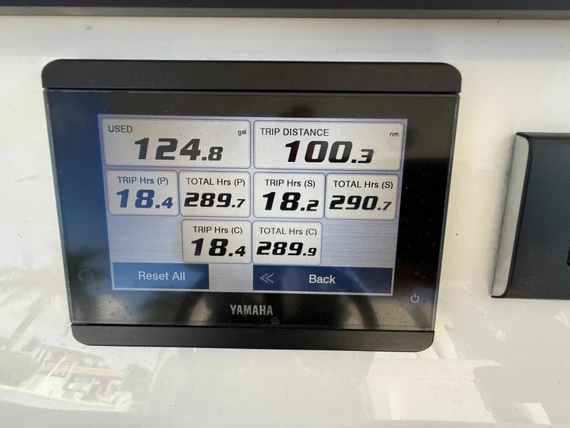 Slide: The Image of Display screen showing trip data for a 2023 Regulator 34 boat. - 13