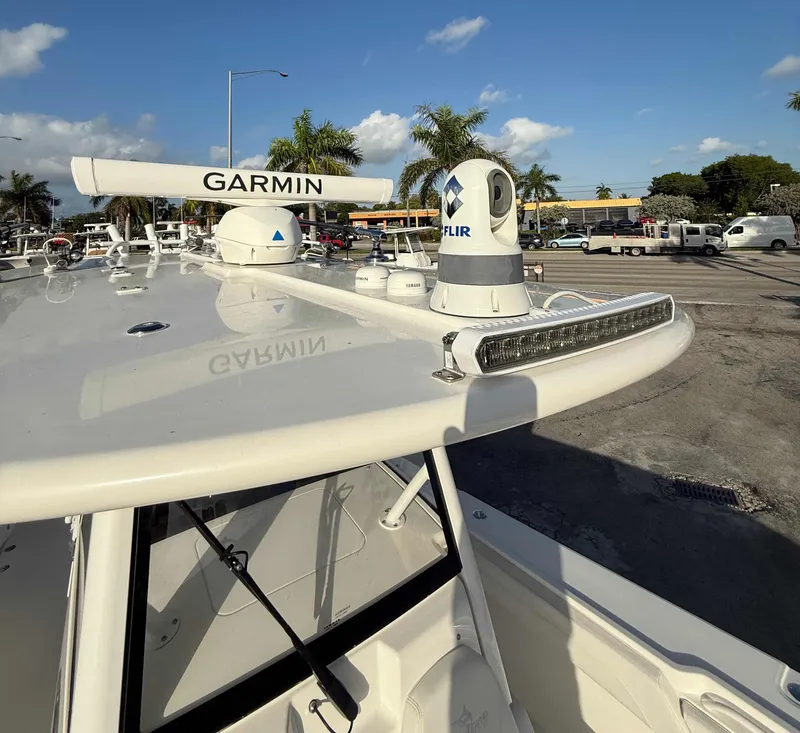 Slide: The Image of 2023 Regulator 34 boat with Garmin and FLIR equipment on deck. - 27